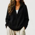 Detailed showcase of the women's black waffle knit deep V-neck casual pullover top view. - S / Tops / Black