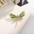 Exquisite green acrylic dragonfly brooch detail, sparkling rhinestones, elegant gold metal pin. - Green
