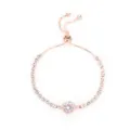 Elegante roségouden tennisarmband met sprankelende zirkoniasteentjes en verstelbare sluiting. - Rond / Roségoud