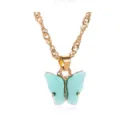 Gouden ketting met een schattige lichtblauwe acryl vlinderhanger voor een zoete stijl. - Ketting / Blauw
