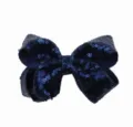 Donkerblauwe pailletten strik haarspeld detail, glinsterend haaraccessoire voor feestjes. - Marineblauw