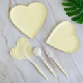 Heart-shaped disposable paper plates set with napkins and cutlery for party and wedding decor. - Yellow Heart