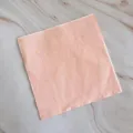 Disposable pink paper napkin with embossed edge, perfect for party desserts and tabletop decor. - 16 Pcs 33x33 Paper Napkins - Blush Pink