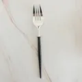 Modern stainless steel dinner fork with sleek black handle and silver tines for dining. - 8 Pcs Black Forks