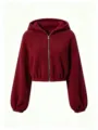 Burgundy sherpa zip-up hoodie detail, showing soft fleece texture and elastic hem and cuffs. - S / Tops / Burgundy