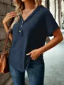 Detailed view of the stylish V-neck short sleeve casual top, showcasing buttons and fabric. - S / Tops / Navy Blue