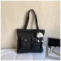 Black denim tote bag for women, casual large capacity shoulder bag with double front pockets. - With Pendant / Black