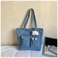 Blue denim canvas tote bag with dual front pockets and cute cloud pendant for daily use. - With Pendant / Light Blue