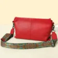 Stylish red genuine leather shoulder bag with ethnic geometric pattern wide strap for women - Red