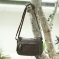 Brown leather shoulder bag for women, stylish commuting crossbody bag with multi zippers. - Coffee