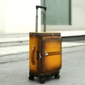 Retro leather trolley suitcase for business travel, vintage brown gradient finish, universal wheels. - Luggage / Brown