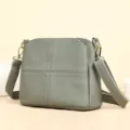 Gray genuine leather crossbody bag for women, versatile shoulder bag with spacious interior. - Gray