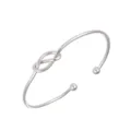 Minimalist silver open cuff bracelet with a stylish knot design and smooth metal finish. - Silver