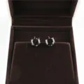 Round black zirconia stud earrings detail view, 8mm minimalist style fashion jewelry. - Gold + Black