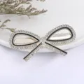 Strass strik haarspeld voor vrouwen, glanzende kristallen legering eendenbekklem accessoire. - Strik