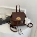 Brown PU leather mini backpack with cute dog embroidery, vintage style casual daypack for women. - With Pendant / Brown