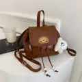 Korean style PU leather mini backpack for women, retro brown schoolbag with cute dog patch. - With Pendant / Brown