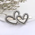 Prachtige strass dubbel hart haarspeld voor vrouwen, glanzende kristallen metalen eendebek clip. - Dubbel Hart