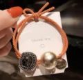 Oranje vintage haarelastiekje met strass en parel, elegante paardenstaarthouder voor vrouwen. - Oranje