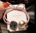 Chic pink braided hair rope with elegant square crystal and pearl pendant for women styling. - Pink