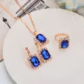 Elegant rose gold blue crystal rhinestone jewelry set including necklace, earrings, and ring. - Square / Sapphire Blue