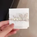 Gold butterfly hair clip with pearls and sparkling crystals, elegant side duckbill hairpin. - Little Butterfly