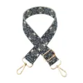 Detailed view of the wide embroidered replacement bag strap with adjustable gold hardware buckles. - Gold Buckle / Off-white Base with Navy Blue