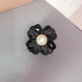 Black acrylic flower hair claw clip with pearl center, cute mini shark clip for girls. - Black