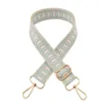 Close-up detail of blue geometric jacquard bag strap with elegant gold hardware buckles. - Beige Light Blue
