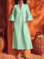 Mint green V-neck dress detail, elegant bell sleeves, stylish linen texture for daily wear. - Emerald Green
