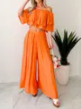 Detail shot of orange off-shoulder crop top and wide leg pants set, casual chic style. - S / Top And Bottom / Orange
