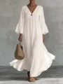 Elegante vestido largo blanco con cuello en V y manga larga de estilo bohemio, ideal para vacaciones. - S / Blanco