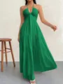 Stunning green halter neck maxi dress with deep V-neck and tiered A-line design for summer parties. - Verdant