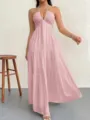 Detailed view of pink halter maxi dress, deep V-neck, sleeveless tiered hem, elegant flowy style. - Pink