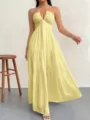 Detail view of the stylish yellow halter deep V maxi dress, perfect for summer parties and beach. - Yellow