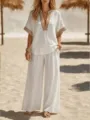 Detalle de ropa de playa con elegante top de cuello en V y pantalones anchos. - S / Parte Superior Y Inferior / Blanco