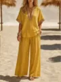 Vista detallada de conjunto casual amarillo para mujer con top de cuello V y pantalón ancho. - S / Parte Superior Y Inferior / Amarillo