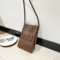 Brown woven hollow crossbody phone bag, stylish mini shoulder bag for casual summer daily wear. - Brown