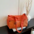 Sac de voyage orange à motif quadrillé, grand sac à bandoulière décontracté pour femme. - Orange