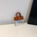 Mini bolso transparente de PVC para llaves, colgante marrón de cuero sintético mini. - Marrón