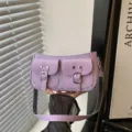 Purple retro shoulder bag with double front pockets and chic metal buckles for daily style. - Purple