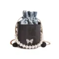 Stylish women's mini box shoulder bag with pearl chain and denim drawstring inner pouch. - Black