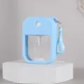 Portable 38ml card spray bottle with blue silicone sleeve and keychain hook for travel use. - Bottle + Silicone Case + Keychain / Blue