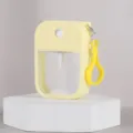 Tragbare 38ml Karten-Sprühflasche mit Silikonhülle und Haken für Parfum und Kosmetik unterwegs. - Gelb