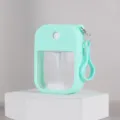 Tragbare 38ml KARTEN-Sprühflasche mit Silikonhülle, ideal für Parfüm und Alkohol. - Cyan