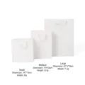 Set of three white minimalist paper gift bags with handles for jewelry packaging - Gift Bag with Handle / S / White
