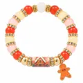 Festive Christmas beaded bracelet with gingerbread man charm and snowy house bead. - Gingerbread Man Style