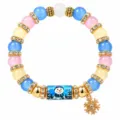 Festive colorful Christmas beaded bracelet featuring a cute snowman bead and snowflake charm - Snowman Snowflake Style