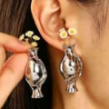 Unique silver vase-shaped brooch pin featuring delicate mini daisy flower arrangement. - Hollow Vase Earrings (4619/Without Flower)