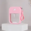 Tragbare 38ml rosa Karten-Sprühflasche mit Silikonhülle und Schlüsselanhänger für Parfum. - Rosa